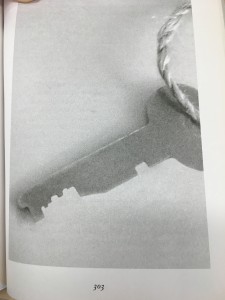 Image taken by me of p.303 of Foer's novel. It depicts the key that Oskar found in his father's closet. It is on a string and he carries it around his neck for most of the novel. 