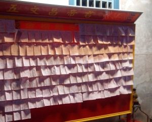 Taiwanese students' temple prayers for good exam results.