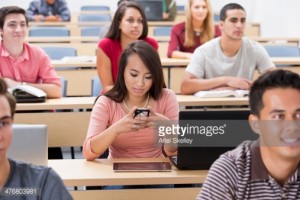 Student texting in class Source: Ariel Skelley (Getty Images)