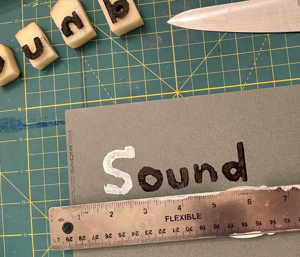 a picture of a piece of paper with a ruler