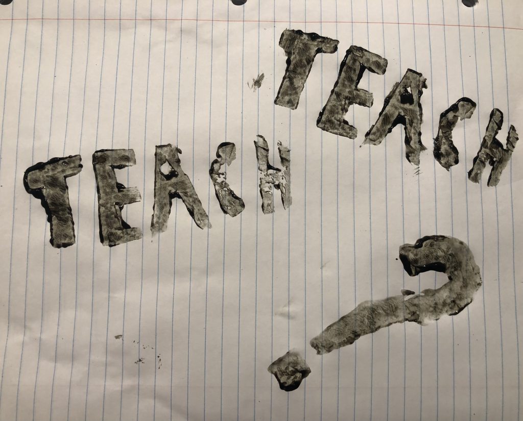 Potato carving print containing the word teach (twice) and a question mark.