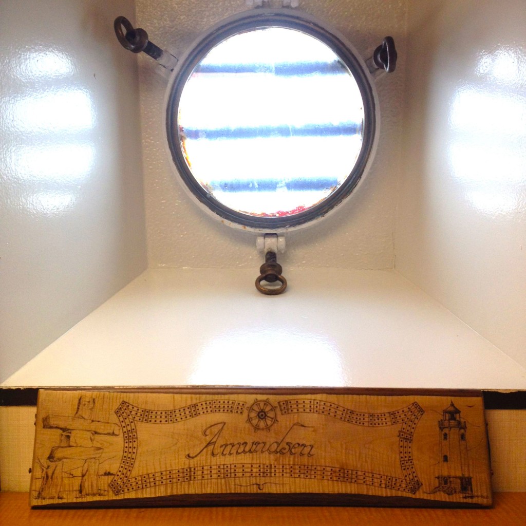The Amundsen’s cribbage board, engraved by a cadet who sailed on it once.