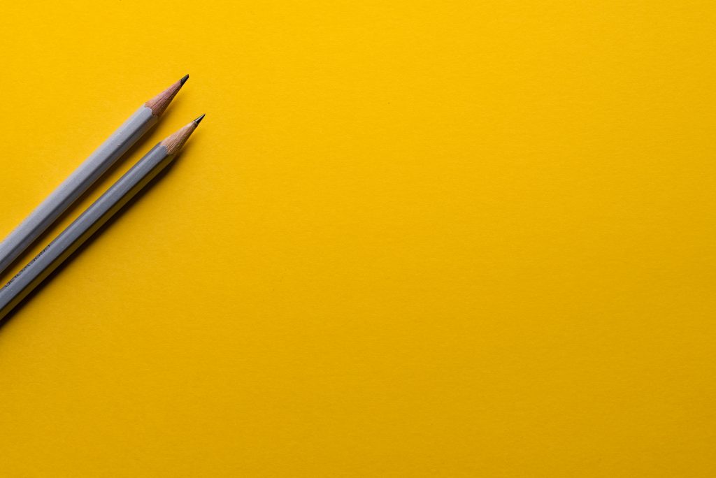 2 pencils on yellow, teaching portfolio