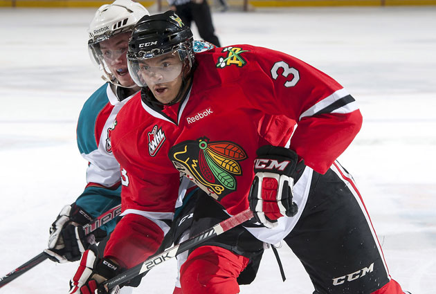 Seth Jones, a former superstar of the Western Hockey League's Portland Winterhawks, fends off an incoming checker in a contest dating back to 2013. Both the Winterhawk organization and subsequent league have been mired down by controversy in recent years. 
