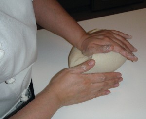 kneading the masa dough