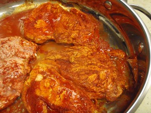 chicken in achiote/bitter orange marinade being fried