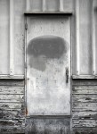 gray door on a gray day