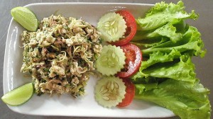 Laarb, also known as 'Larp', a spicy pork dish that is rolled up in lettuce leaves