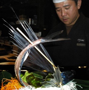flying fish sushi being prepared