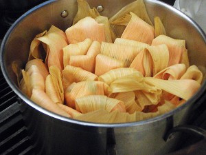 pack the wrapped tamales into the pot