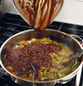 add red salsa to the chorizo/nopales/onion mix