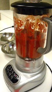 blending the Guajillo chiles and tomatoes