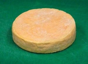 test the Munster cheese for ripeness by pressing the edges of the round