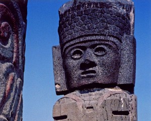the volcanic stone face of one of the Toltec warriors or 'Atlantids' at Tula, Mexico