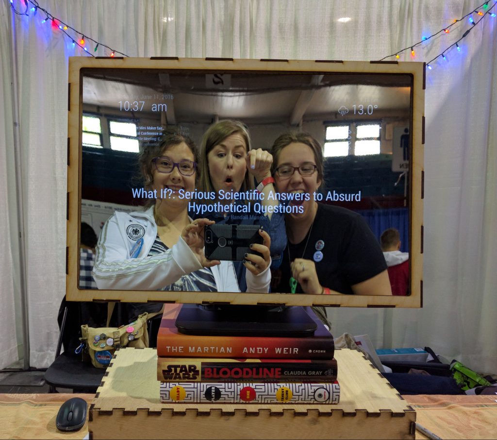 humans reflected in magic mirror displaying book recommendation