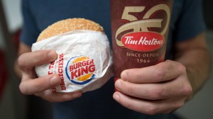 A cup of coffee from Tim Hortons and a burger from Burger King