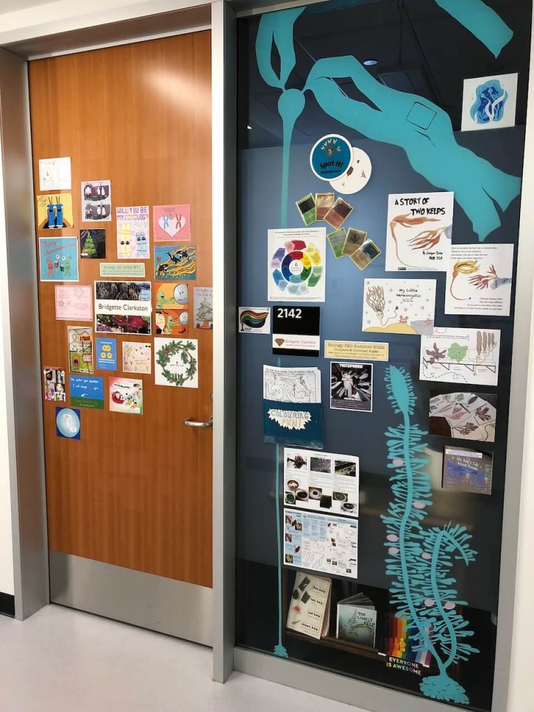 Office door with various student work posted