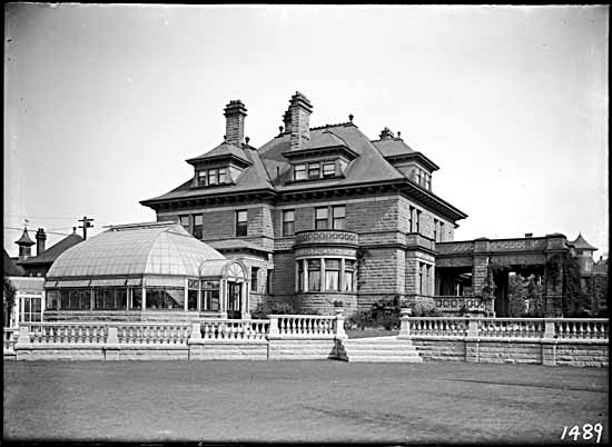 A large extravagant home made from quarried rock, depicting the wealth of B.T. Rogers.