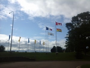 Happy Canada Day. The four flags show the different layers of stories that are relevant to the ground on which I stand, and as a Canadian citizen I am automatically inducted to the national narrative, whether I believe it or not.