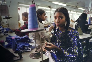 A young girl working in a sweatshop in Bangladesh
