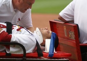 Figure 1. MLB player, Yadier Molina, after suffering a mild concussion, courtesy of Wikimedia Commons 