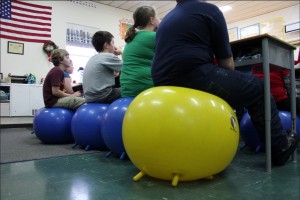 Sit with an exercise ball. Source: Flickr Commons