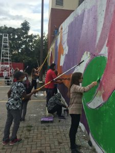 Participants working on the Brantford mural