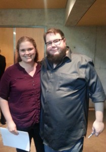 Miss Morris posing with Shane Koyczan - the voice behind the poem, Educate the Heart. Shane Koyczan's poetry was used to introduce students to spoken word poetry and also inspire them to challenge their previous notions of poetry and take risks with their writing. 