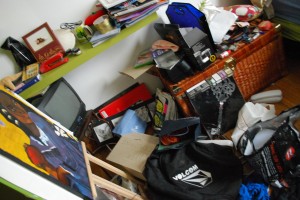 Messy, messy bedroom and lots of shopping bags