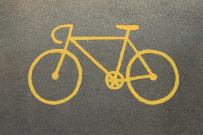 Yellow Bicycle Sign on Track by Keerati | Freedigitalphotos.net