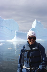 Rose in Illulissat in front of Iceberg.