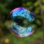 1024px-Reflection_in_a_soap_bubble_edit_cropped