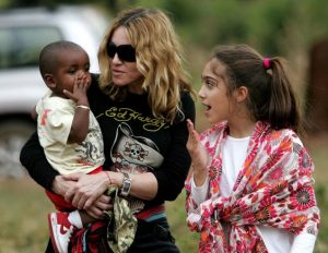 Madonna in an orphanage in Malawi with her adopted son. http://www.thehindu.com/opinion/op-ed/where-family-aid-offers-alternative-to-orphanages/article61097.ece