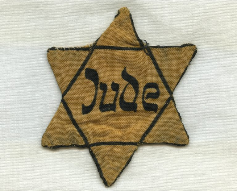 Suitcase; Star Of David Badge – Literary Representations Of The Holocaust