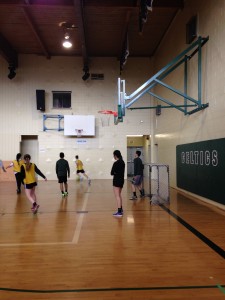 Grade 9 Physical Education class playing soccer