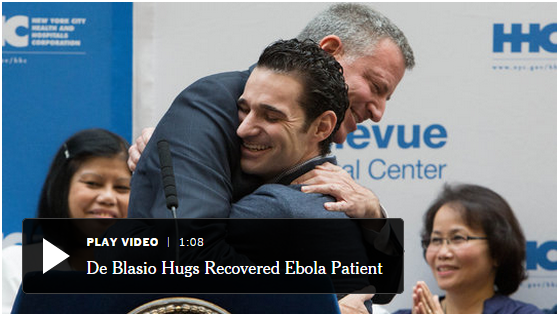 de Blasio, Mayor of New York, hugs Dr.Spencer