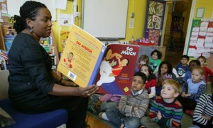 Teacher-reads-to-infant-s-001