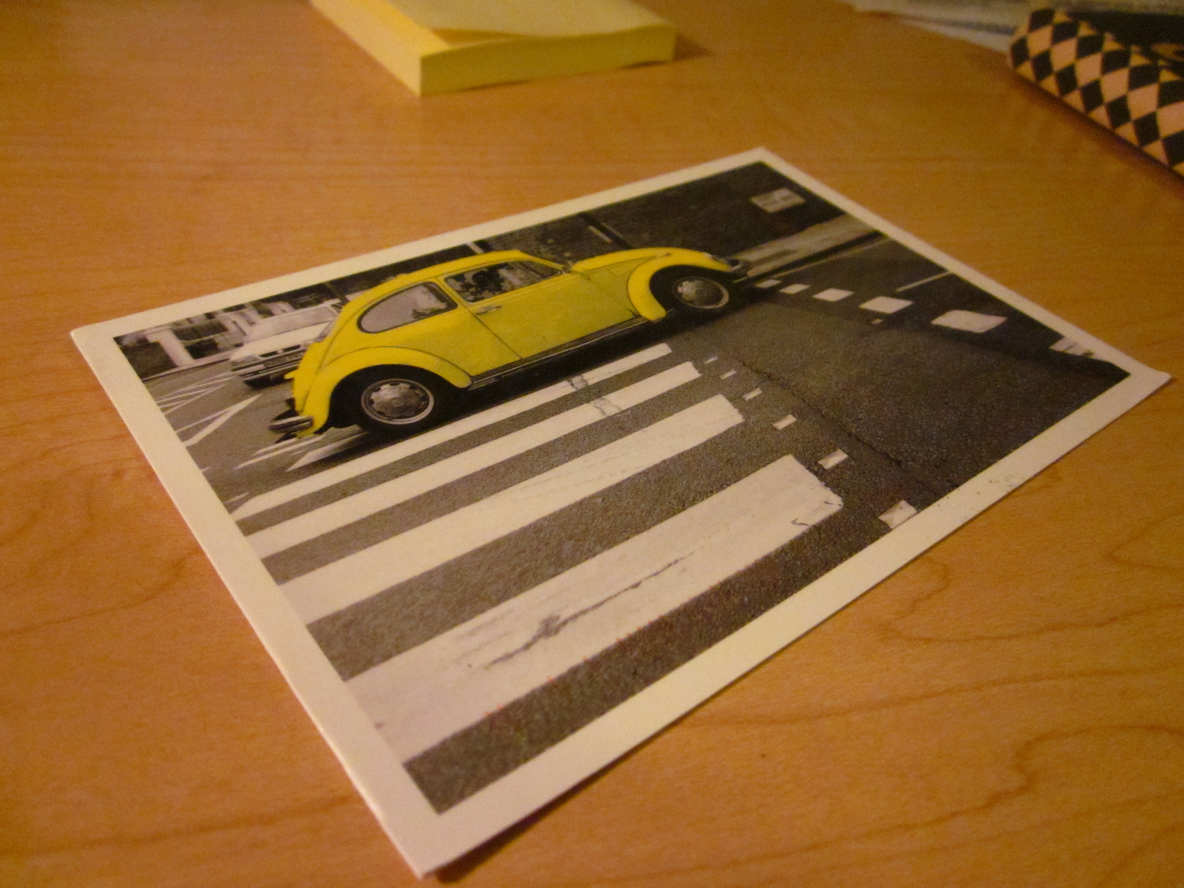 London postcard of yellow car
