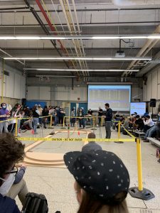 Race track meant for hovercrafts roped off and surrounded by MECH students.