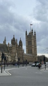 Another view of the Palace of Westminster on a typical London cloudy day. The streets are calm and winding.