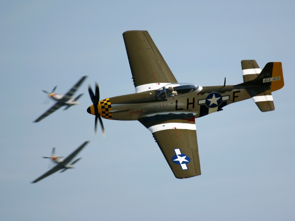 P51WithTwoInBackground