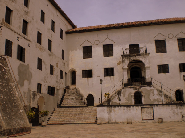 standing in the courtyard of Elmina Castle