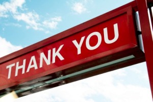 sign - THANK YOU - dark red background and white letter, blue sky