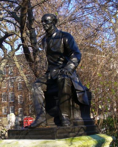 John Stuart Mill statue, Temple Gardens, London, Flickr photo shared by Joaquin Martinez, licensed CC BY 2.0