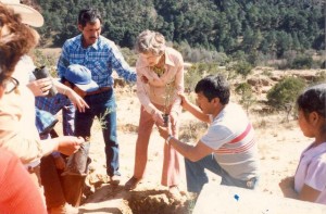 Mildred Fahrni planting a tree in Mexico