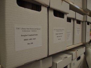 Archival storage boxes on a shelf