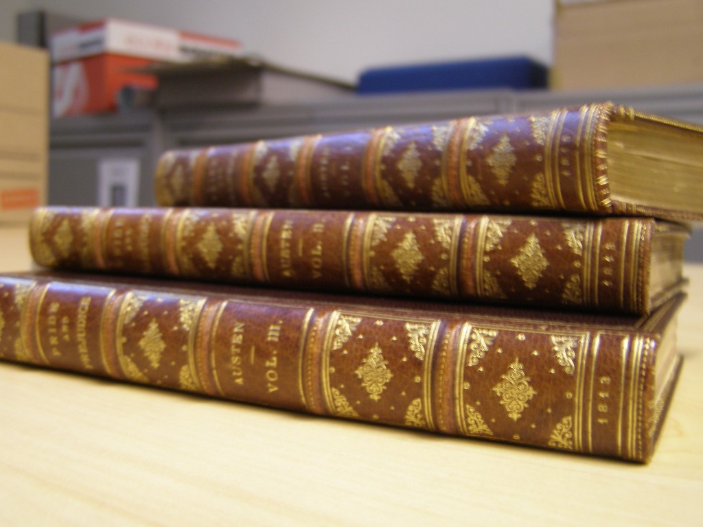 Image of book spines of three volume Pride and Prejudice