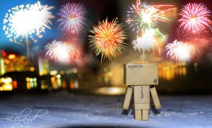 New Year box robot looks at fireworks