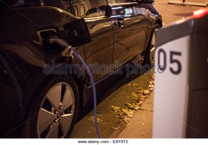 paris-france-october-02-2014black-electric-car-in-charging-at-night-e8y8t2