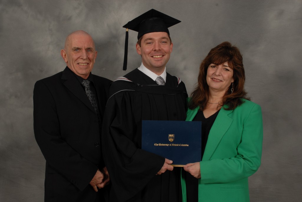 Executive MBA graduation, November 2011. Mark with his parents Ken and Kathy.
